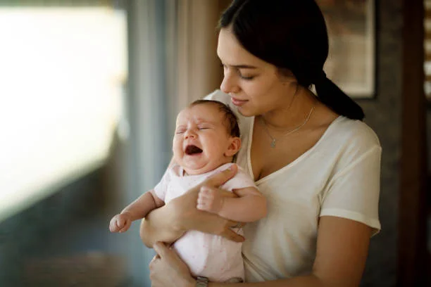 Baby Colic Symptoms and Remedies - How to identify and treat newborn colic